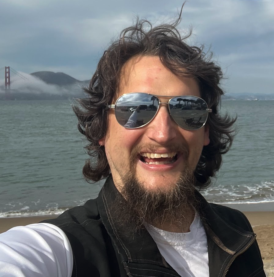 author: Wind and Wireless founder, standing near experimental aircraft